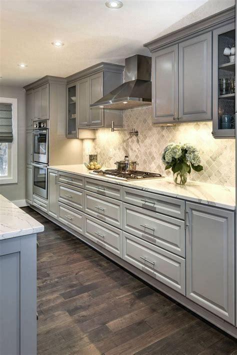 grey cabinets with island cooktop steel knobs|light grey kitchen cabinets.